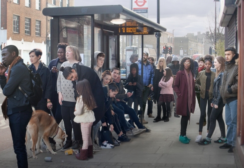 The company of Boy at an Essex Road bus stop. (c) Kwame Lestrade